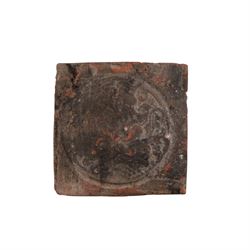 Three medieval tiles, decorated in relief, H10cm