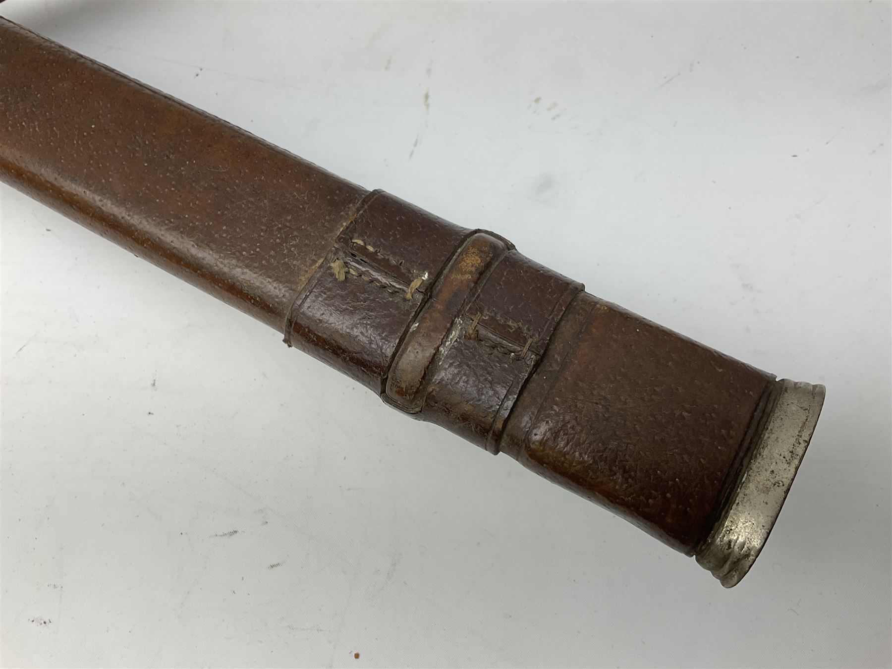 Victorian artillery officer's sword, the 90cm fullered steel blade by E. Thurkle Denmark Street Soho London decorated with Victoria cypher, Regimental crest and 'Royal Artillery', three-bar hilt with stepped pommel and wire-bound fish skin grip; in leather covered scabbard L107cm overall