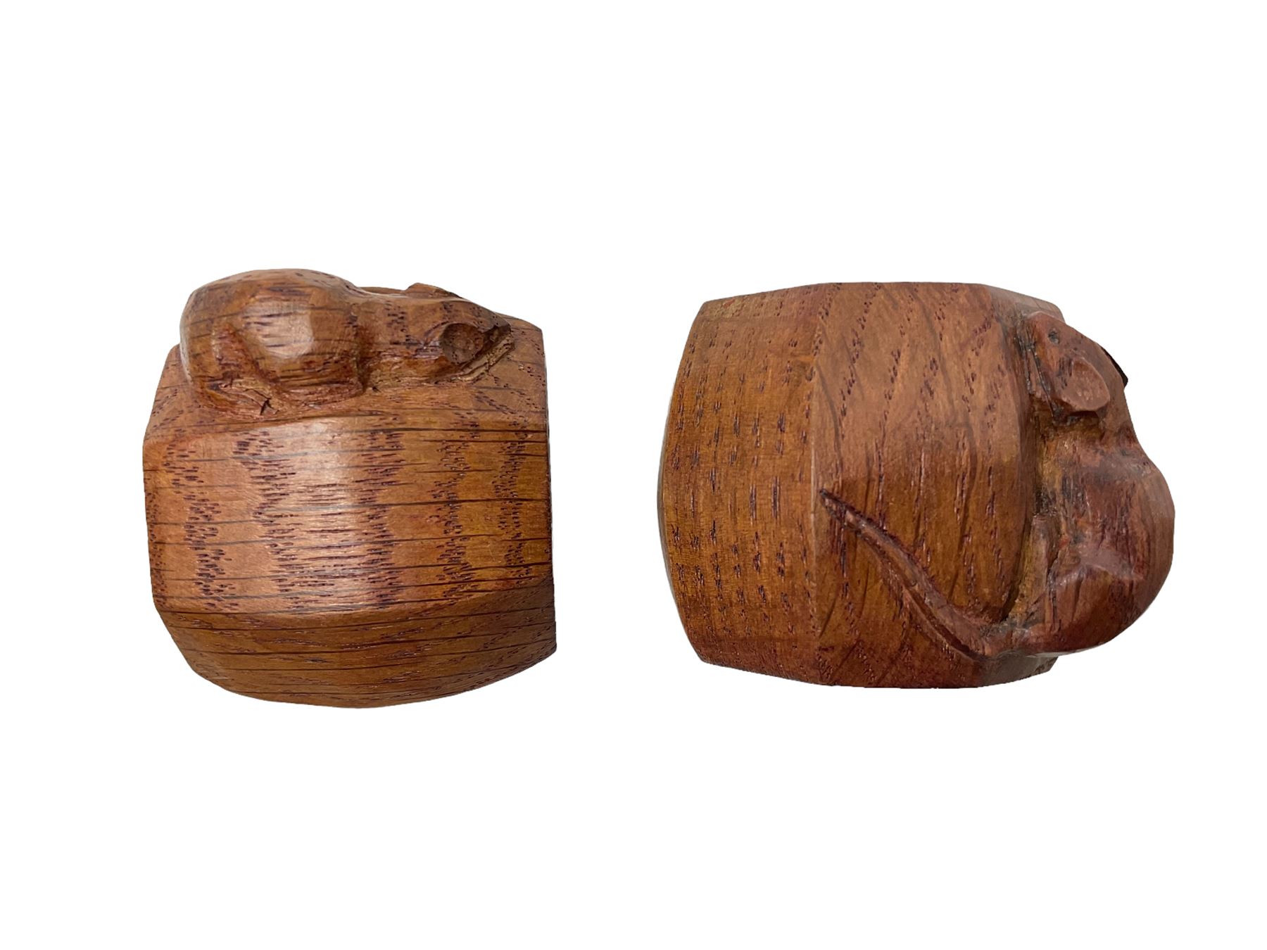 Mouseman - pair of oak napkin rings, of bulbous octagonal form each carved with mouse signature, by the workshop of Robert Thompson, Kilburn, L4cm W6cm