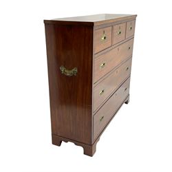 Georgian military type campaign chest, narrow rectangular top over three short and three long drawers, recessed brass handles, on bracket feet