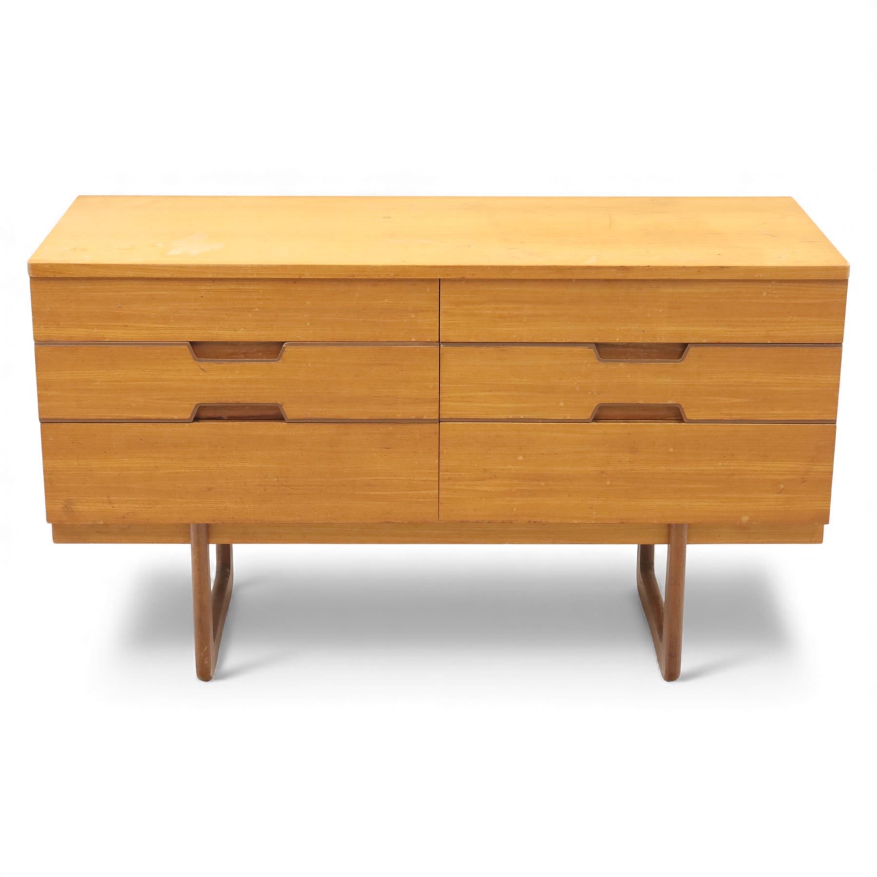 Uniflex - Mid 20th century teak sideboard, rectangular top over six drawers with recessed finger pulls, raised on U-shaped teak supports