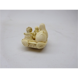  19th century Japanese ivory Netsuke of three figures on a boat reading, drinking and playing the lute, L5cm   