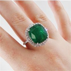 18ct white gold emerald and diamond cluster ring, single cushion cut emerald of approx 13.20 carat, with round brilliant cut and baguette cut diamond surround and shoulders, stamped, total diamond weight approx 0.80 carat
