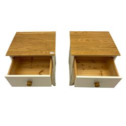 Pair of cream finish bedside lamp chests, fitted with two drawers, oak top and handles