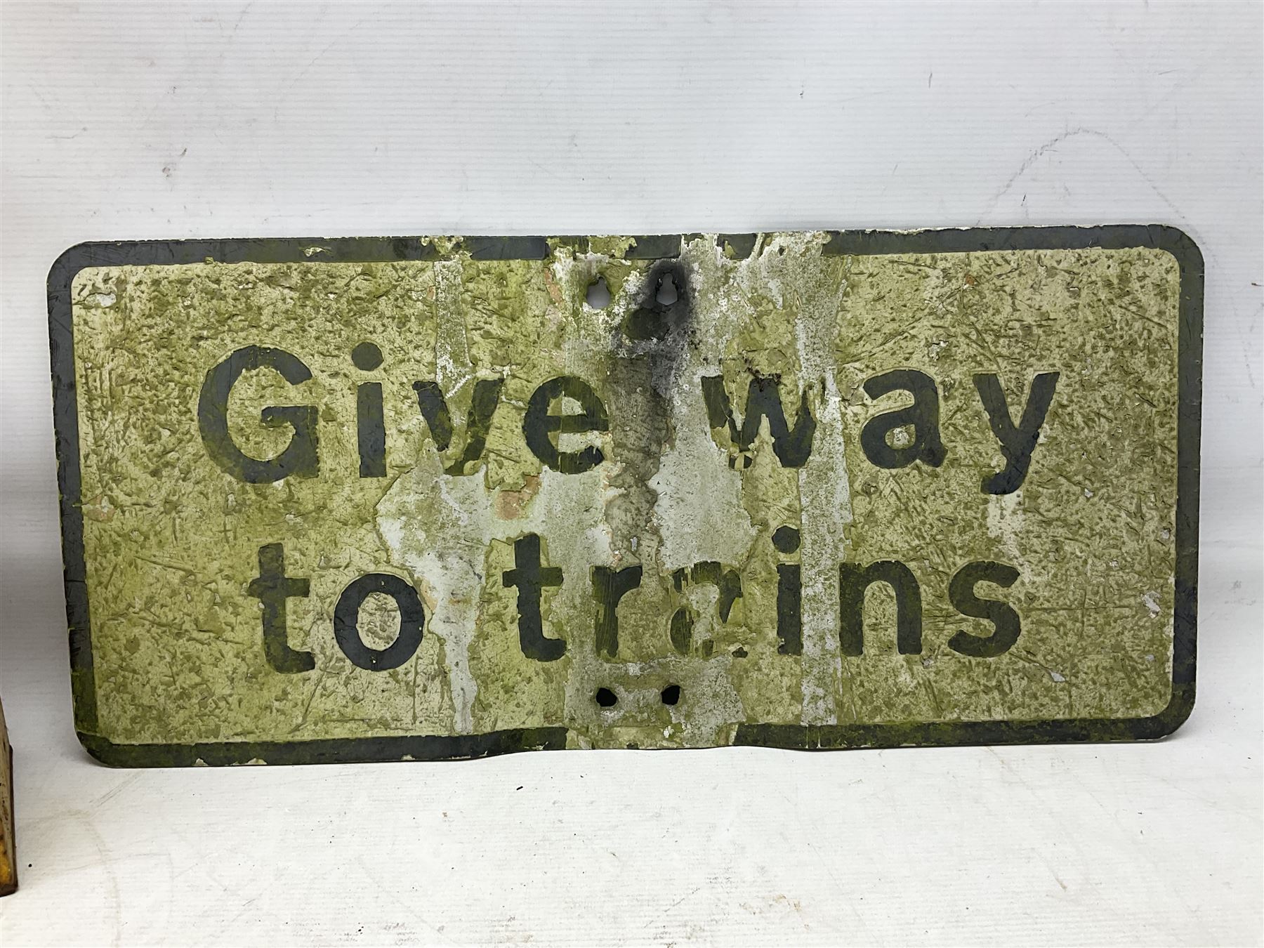 Victorian cast iron railway wagon plate, 'To Carry 10 Tons 4012, Registered by LNER-D 1898', together with a similar mid 20th century example, a smaller cast iron LMS wagon plate, Chalwyn signalling lamp, Give Way to Trains enamel sign and an enamel signal sign