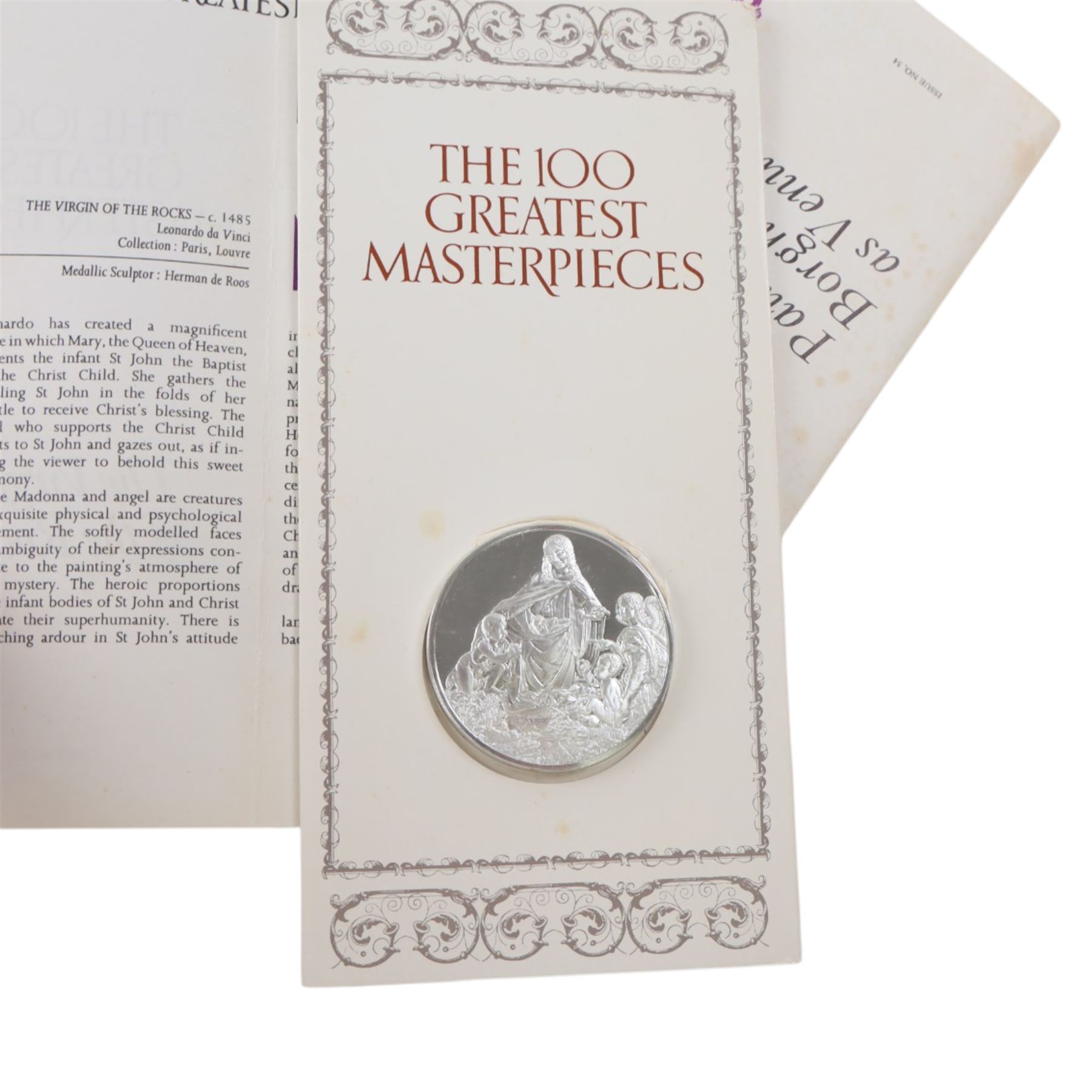 John Pinches 'The 100 Greatest Masterpieces' set of one hundred silver medallions, each on presentation card with information leaflet, together with the corresponding wooden display cabinet