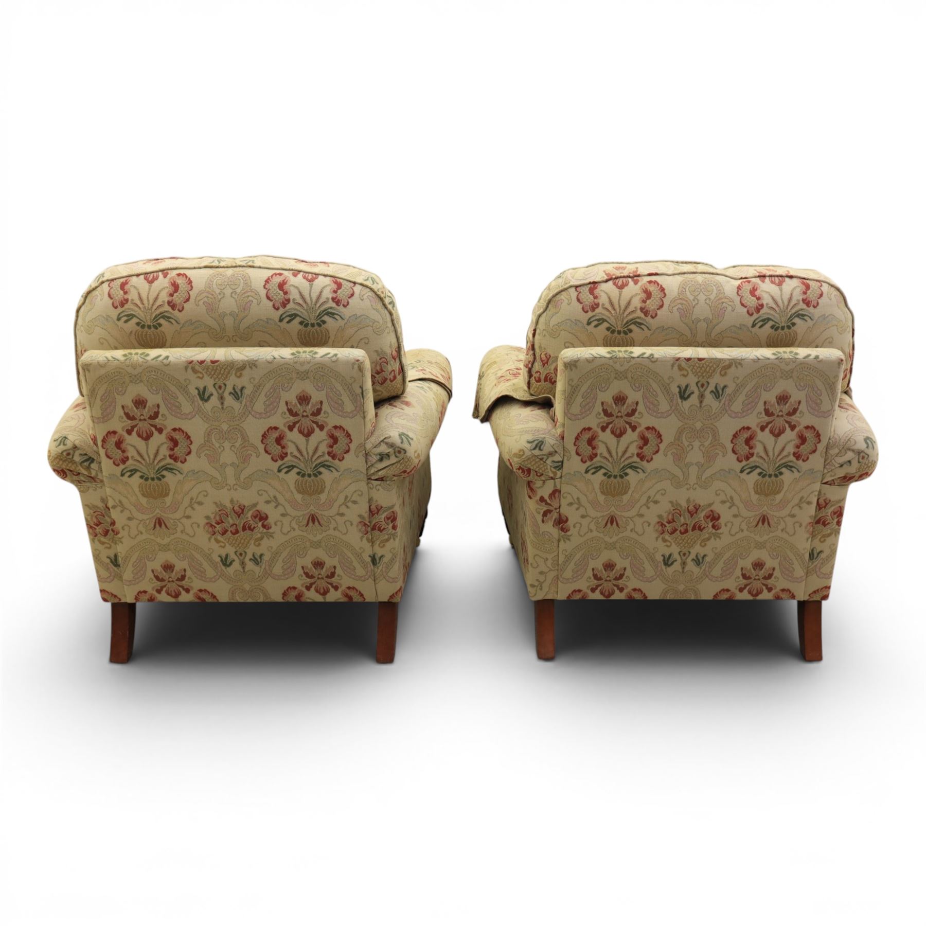 Parker Knoll - 'Henley' floral fabric living room suite, comprising a two seat sofa and pair of armchairs, raised on dark stained turned feet raised on brass castors

Armchairs (H 99cm, W 95cm, D 100cm)