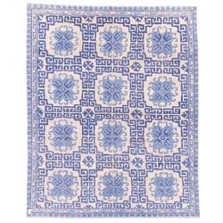 Late 20th century Chinese hand-woven wool carpet, ivory field with a lattice of stylized l...
