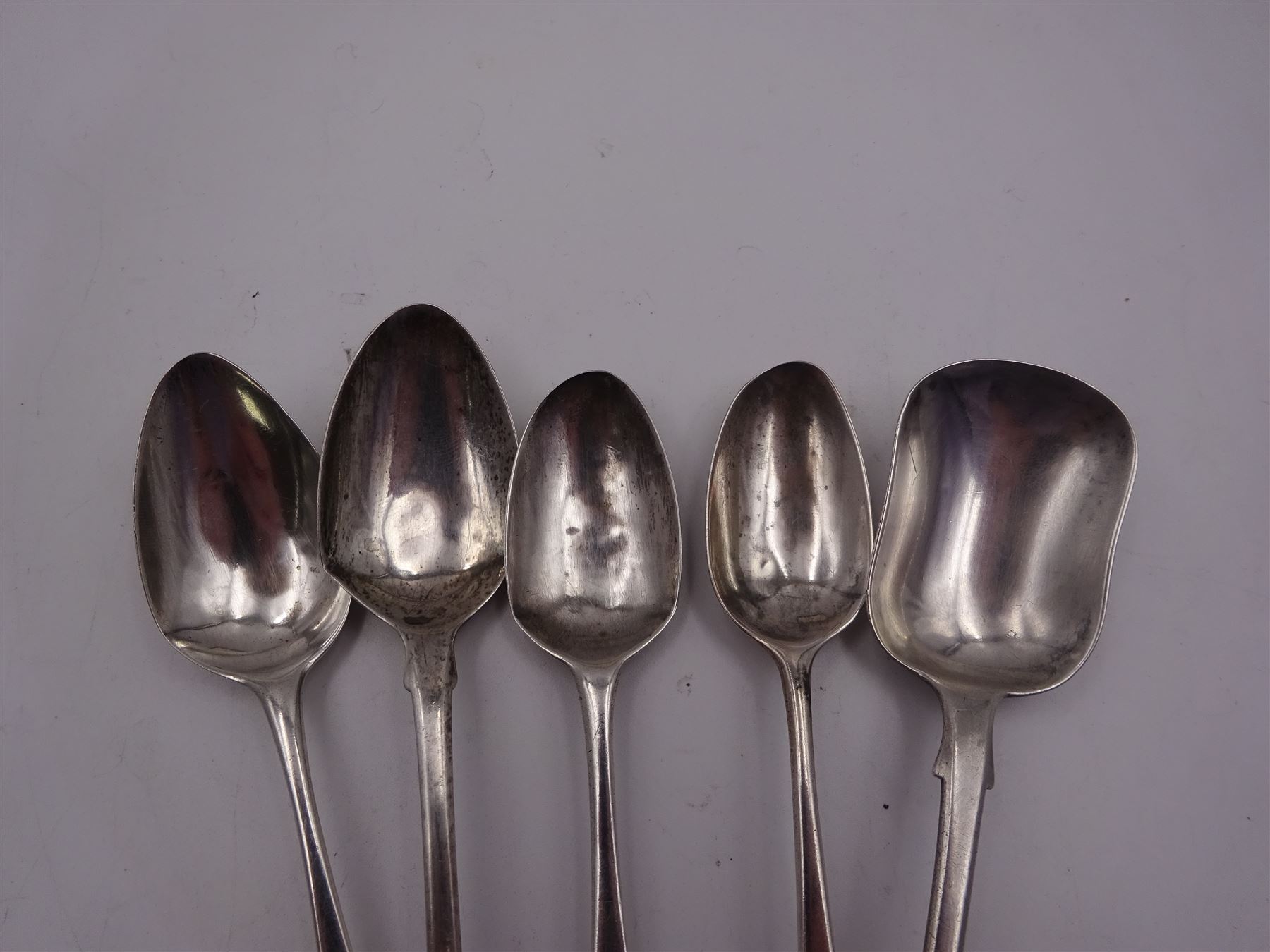 Group of silver spoons, including set of six 1930's silver coffee spoons, hallmarked W H Haseler Ltd, Birmingham 1934, contained within a fitted case, a set of four William IV Old English pattern teaspoons, no assay office mark, date letter for 1835, maker's mark worn and indistinct, a 1930's pickle fork with mother of pearl terminal, hallmarked Viner's Ltd, Sheffield 1934, and four other silver spoons, approximate total silver weight 5.39 ozt (167.5 grams)