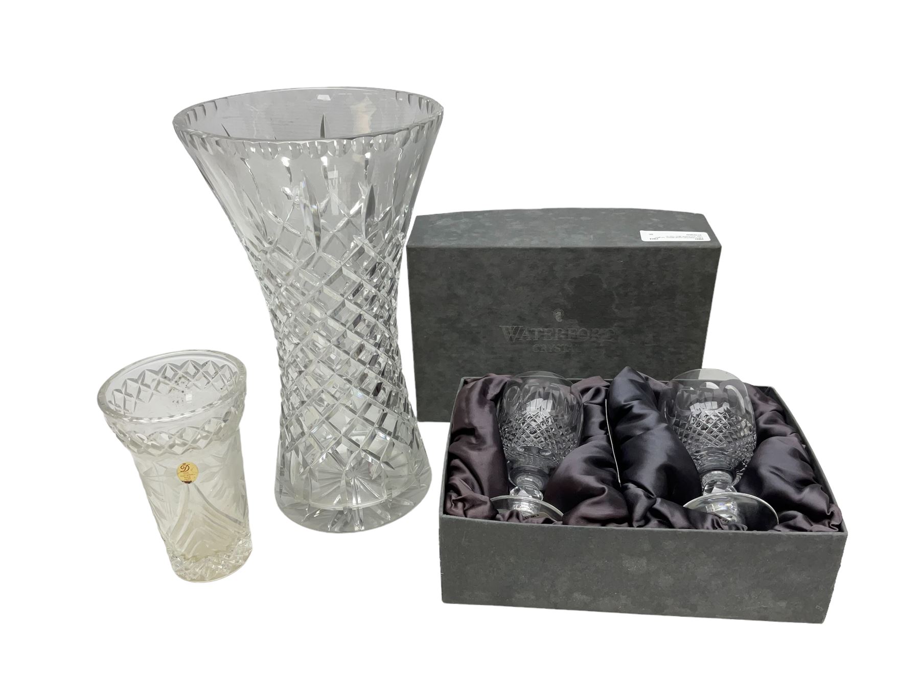 Pair of Waterford crystal glasses, cut glass vase, and another glass vase (4)