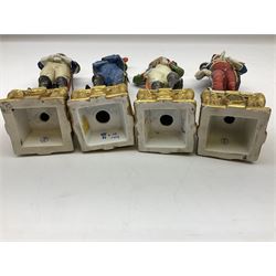 Group of seven Capodimonte figures of soldiers, to include four Bruno-Merli examples including Officer of the 12th Lancers 1820 and Captain of the 18th Hussars 1815, both raised upon ornate gilt plinths bearing British monarch motto in Latin 'Dieu et mon droit', and three further similar, all with crowned N mark beneath, tallest H32cm