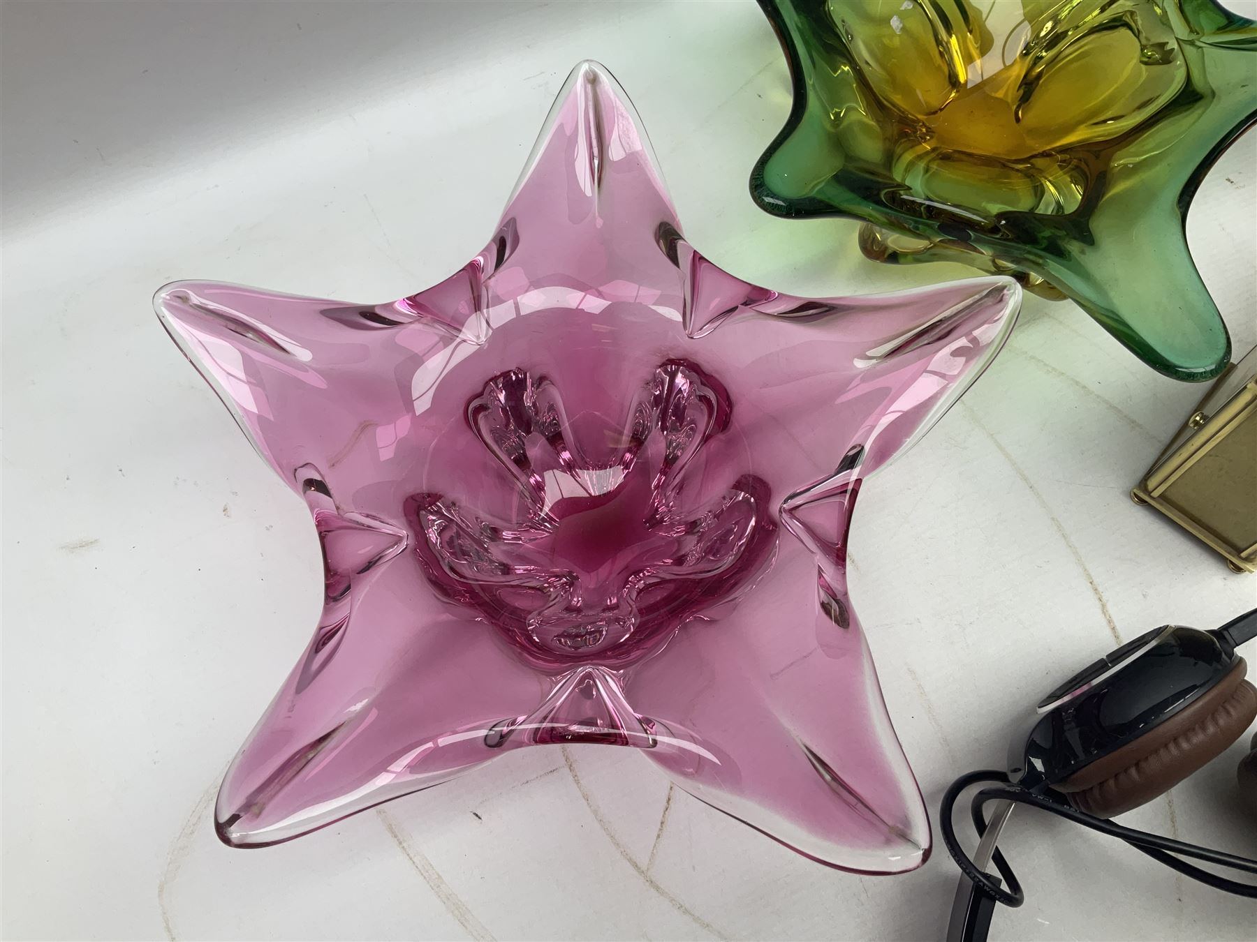 Metamec and H. Samuel battery operated brass carriage clocks, bronzed style abstract figure signed 'Cotp W', two art glass splash bowls, etc