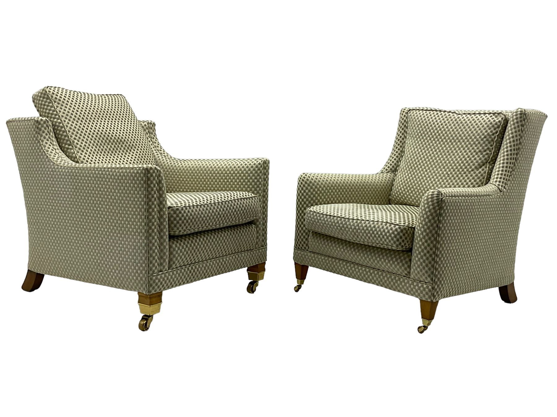 Three-piece hardwood-framed lounge suite - large two-seat Knole sofa with drop ends, upholstered in patterned fabric decorated with urns and foliage (W190cm, D117cm, H88cm); armchair upholstered in contrasting geometric pattern fabric (W83cm, D102cm, H93cm); and another armchair (W82cm, D102cm, H92cm) (3)