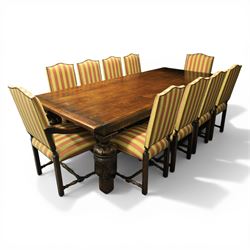 Royal Oak Furniture Co - Jacobean style oak dining table with suite of ten oak high back dining chairs (8+2), rectangular plank top dining table with moulded edge above carved frieze, raised on bulbous turned supports united by stretchers, together with a set of oak framed high back dining chairs including two carvers, upholstered in striped fabric with studded borders, on turned supports united by stretchers 