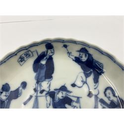 18th century Chinese blue and white Kangxi teacup and saucer, decorated with dancing figures, four character Kangxi mark beneath, saucer D10cm