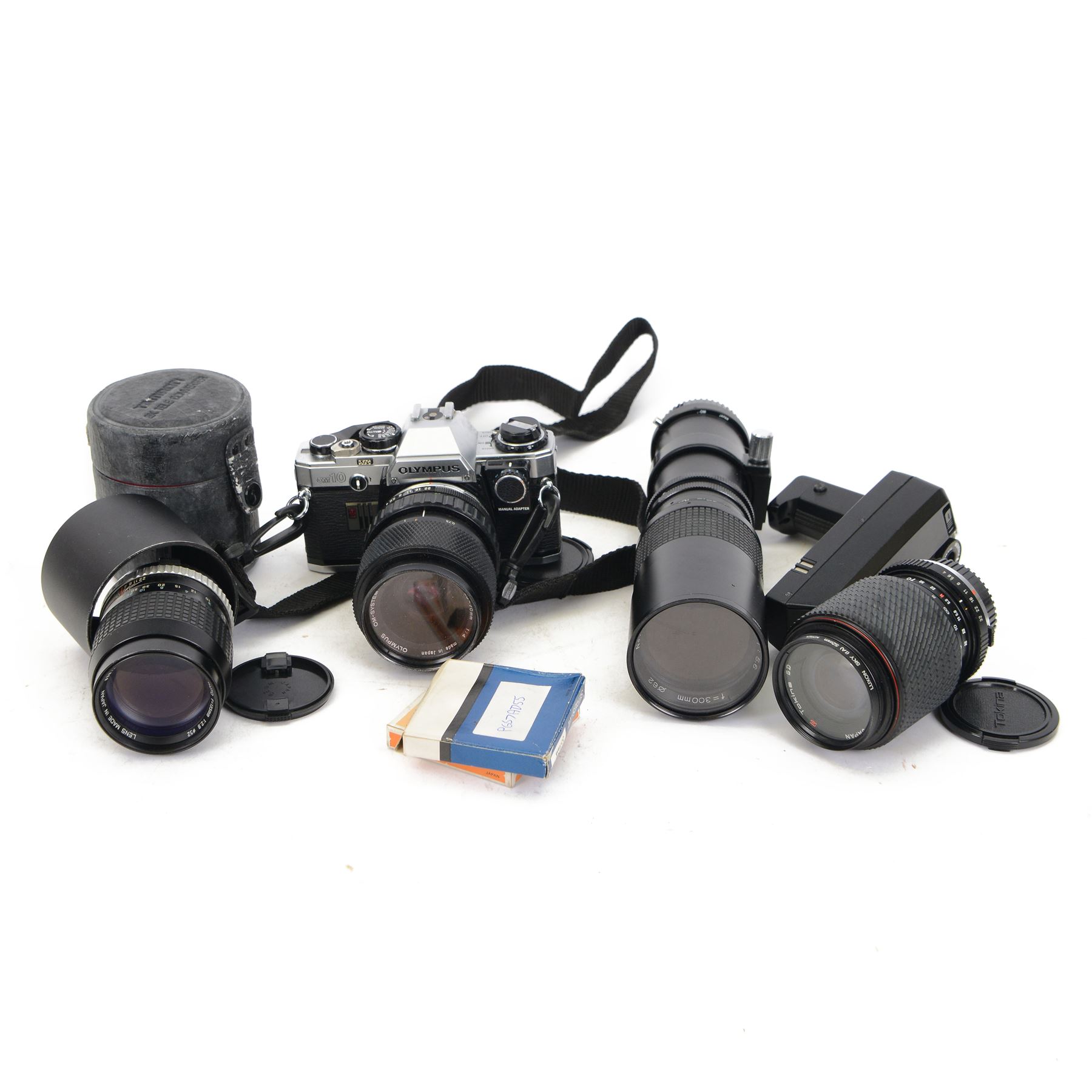 Olympus OM10 camera body serial no. 2279129, together with an Olympus OM-System S Zuiko Auto-Zoom 35-70mm 1:4 lens serial no. 283352, a Paragon 1:5.6 f=300mm 62 lens serial no. 12053, Hoya HMC Tele-Auto f-135mm 1:2.8 52 lens serial no. 638199, Tokina SD 70-210mm 1:4-5.6 52 serial no. 8844630, Olympus OM winder 2, Colly miniature/spy camera and other accessories in a Fotima carry case