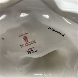 Royal Crown Derby figurine, Winter, modelled as a man with crossed arms on ice skates, by M. Townsend, with printed marks beneath, H24cm