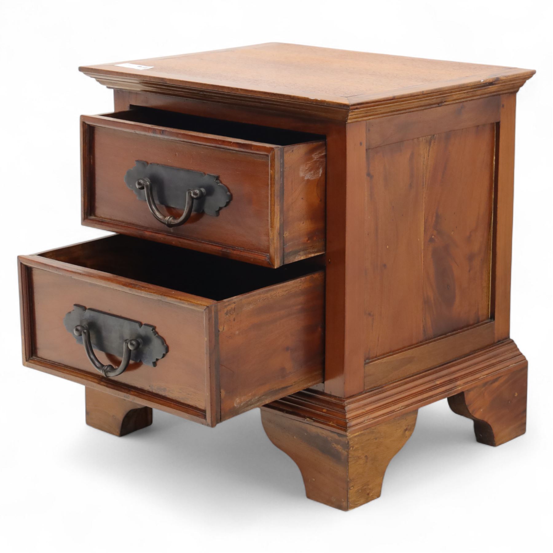 Singapore hardwood bedside chest, rectangular moulded top above two drawers fitted with metal plate handles, on shaped bracket feet