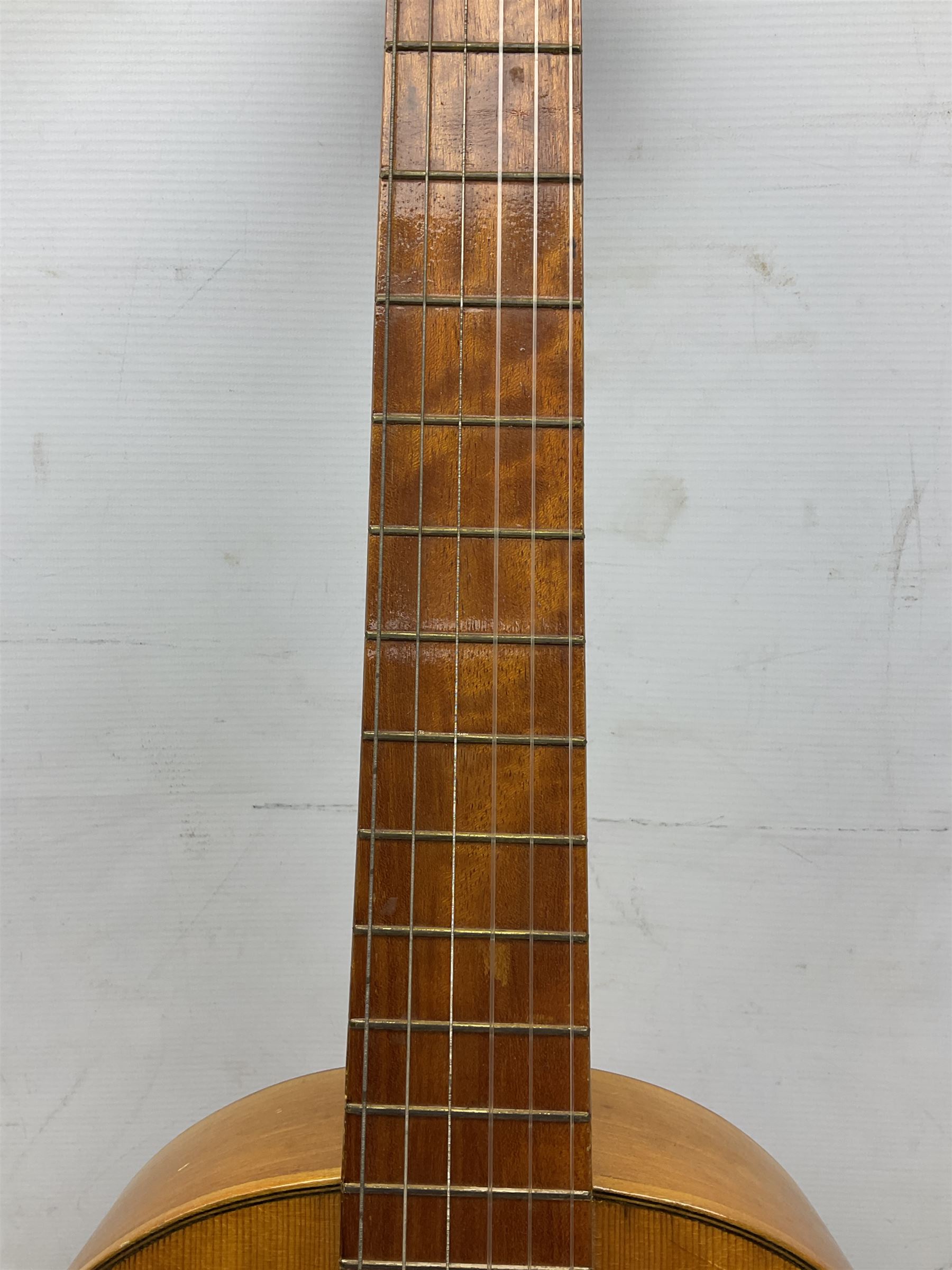 Encore black electric cut-away guitar L96cm; and Spanish Victor Garcia model 187 acoustic guitar, bears label dated 1972 L99cm; each in soft carrying case (2)