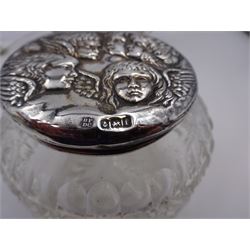 Group of silver, comprising silver mounted cigarette box, engraved with initials,  sauce ladle, twin handled open sucrier, glass jar with silver lid embossed with cherubs and a miniature scent bottle with engraved leaf decoration and initials, all hallmarked, cigarette box H5.5cm