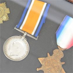 Victorian Queens South Africa Medal with Belfast Orange Free State and Cape Colony clasps, Kings South Africa medal, awarded to 72 Pte W Wilson Scots Gds and WWI war medal and 1914 star, awarded to 9335 Pte W Neilson S Gds, all framed with Scots Guard Beret badge to the centre 