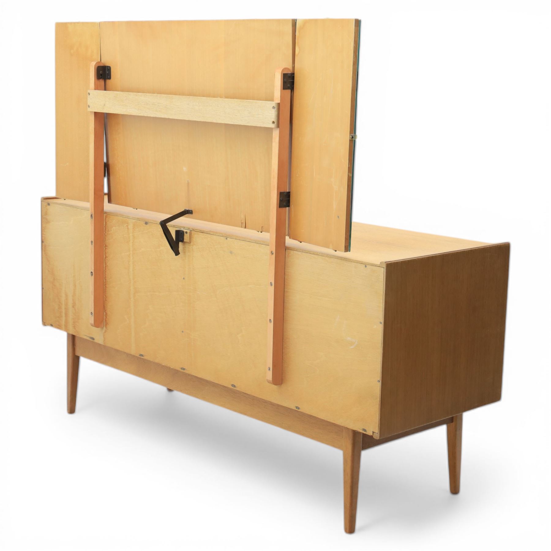 Golden Key By Palatial Ltd - mid-20th century teak dresser, three part mirror above a rectangular top, with six drawers with brass handles and pulls, upon splayed tapering legs 