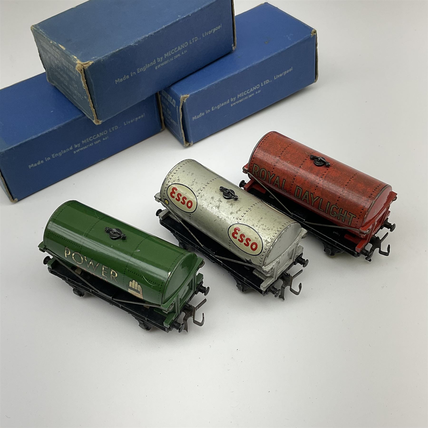 Hornby Dublo - Petrol Tank Wagon D1 'Power Ethyl'; Oil Tank Wagon D1 'Royal Daylight'; and Petrol Tank Wagon D1 'Esso'; all in medium blue boxes (3)