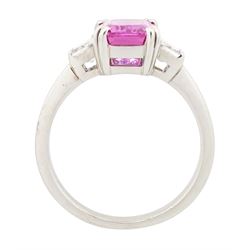 Platinum unheated pink sapphire and diamond three stone ring, emerald cut unheated sapphire of approx 3.16 carat, with a single trapeze cut diamond set either side, London 2014, total diamond weight approx 0.71 carat, with Alan Poultney Gems report, the sapphire with The Gem & Pearl Laboratory report