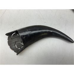 Carved water buffalo horn wall pocket, engraved with landscape scene with patterned borders with pierced foliate panel, together with a pair of horns with similar engraved decoration, L47cm