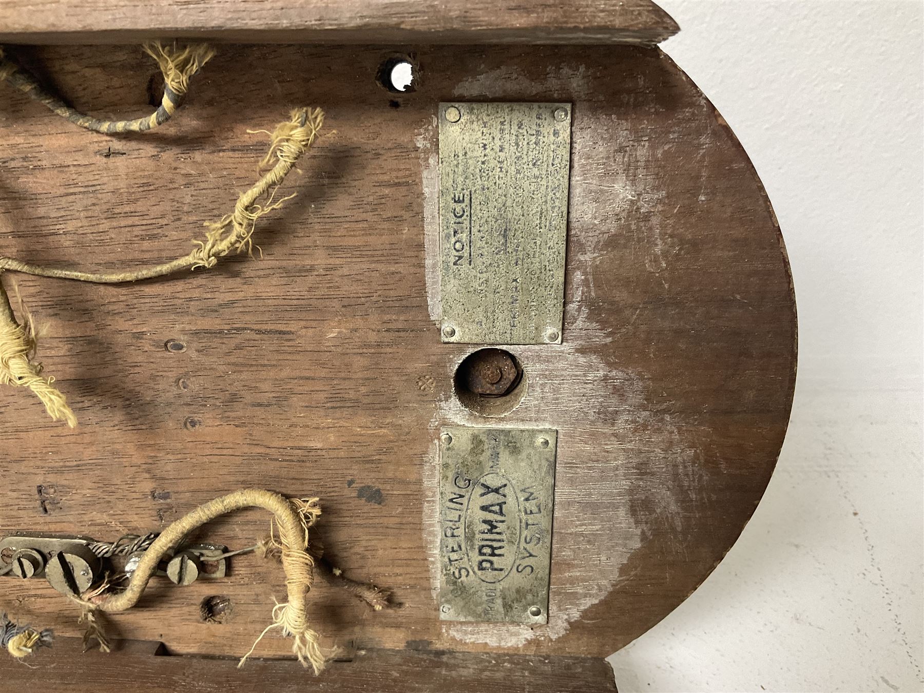 Two Hunningscone patent wall mounting telephones in walnut casing, together with Sterling Telephone & Electric Co. Ltd early wall-mounted telephone 'Primax' and one other 