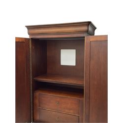 Cherrywood double wardrobe, two panelled doors enclosing hanging rail and two drawers, shaped plinth on bracket feet
