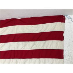 American 100% cotton 'Stars and Stripes' flag by The Valley Forge Company Inc. Pennsylvania 140 x 260cm; and a Union flag 88 x 176cm (2)