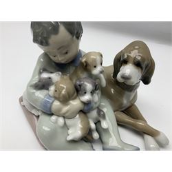 Pair of Lladro figures comprising 'Mis Amigos' model no 5456, and 'Bashful Bather' model no 5455, both with boxes