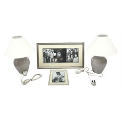 Pair Denby table lamps, with floral decoration on a mottled purple ground, with cream lampshades, together with two framed pictures of the Rolling Stones, lamp H40cm