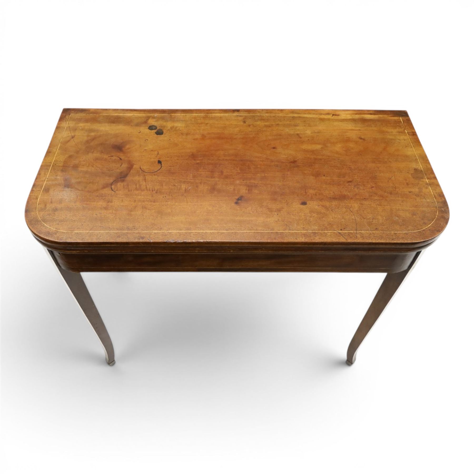 George III mahogany tea-table, the D-shaped rectangular fold-over top with satinwood stringing, raised on elegant square tapering and splayed supports with spade feet and gate-leg action