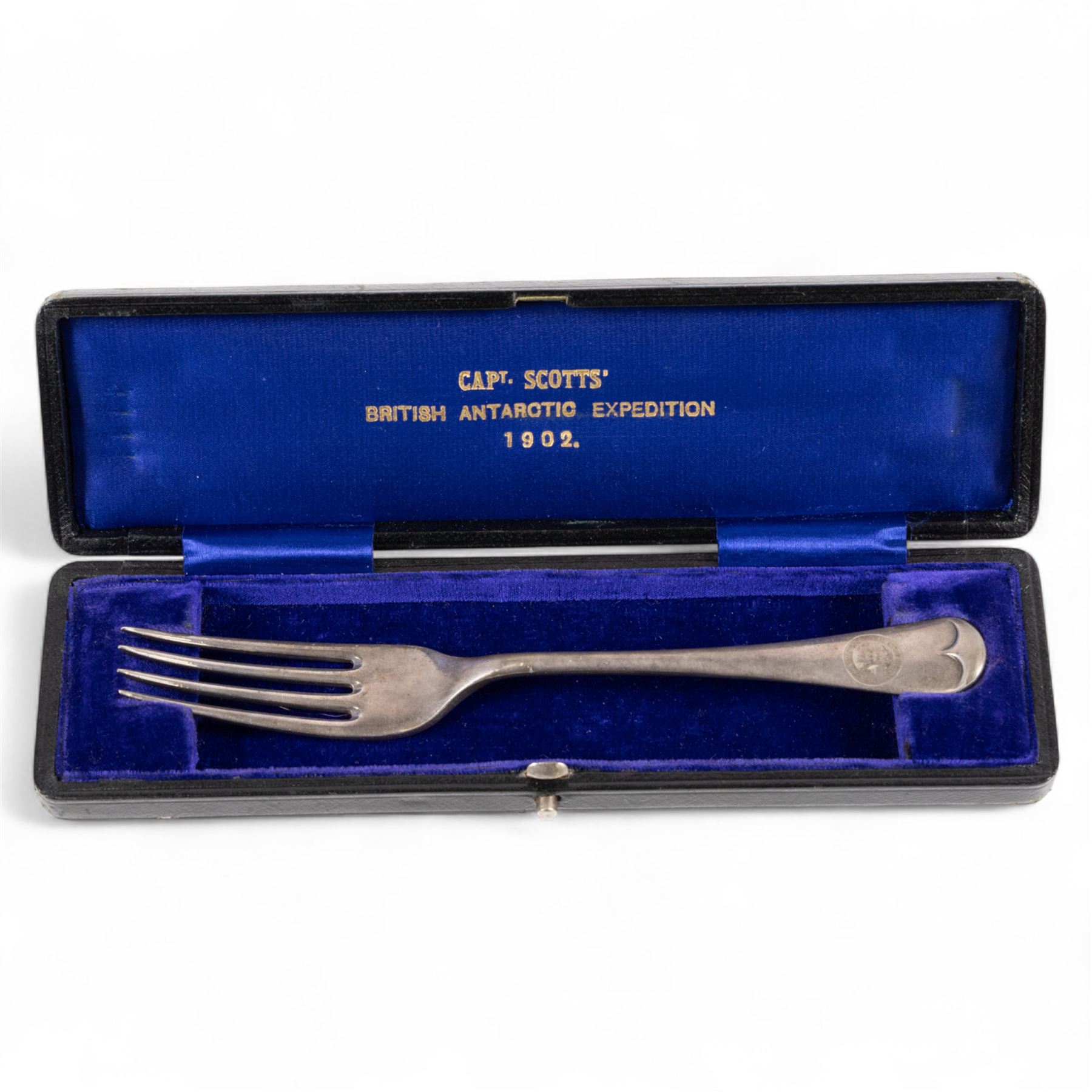 Capt Scotts' British National Antarctic Expedition 1901-1904: table fork from relief ship SY Morning, an electroplated nickel silver table fork, engraved with circular crest reading 'National Antarctic Expedition SY Morning', the fork with maker's mark for Daniel and Arter Ltd, Birmingham, stamped with trade name 'Nevada Silver', in tooled leather case impressed with gilt initials 'AMHC', with blue silk and velvet interior, the gilt lettering to interior reading 'Capt Scotts' British Antarctic Expedition'

Notes: The SY Morning was a steam yacht that served as a relief and resupply vessel for Captain Scott's Discovery during the British National Antarctic Expedition 1901-1904
