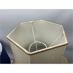 Modern pierced oriental white ceramic vase shaped table lamp, together with a blue and white baluster shaped example decorated with figures upon elephants, both with shades, tallest H83cm incl shade