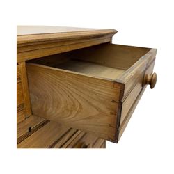 Late 19th century ash chest, fitted with two short and four long drawers, turned wooden handles