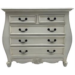 French design bombe shaped chest, moulded rectangular top over two short and three long drawers, on scrolled feet, in cream paint finish 