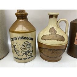 Large stoneware two tone flagon with black lettering Folkard Chemist Pavement York, together with two stoneware jugs, Bronte Yorkshire Liqueur and Creedy Vintage Cider, and salt glaze example, together with four vintage glass bottles, tallest H33cm
