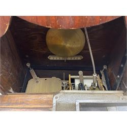 Early 20th century oak cased time recorder, circular Roman dial signed 'Time Recorders Leeds Ltd. Park Lane & Oxford Row Leeds', the glazed door signed 'National Time Recorder Co Ltd. London...'