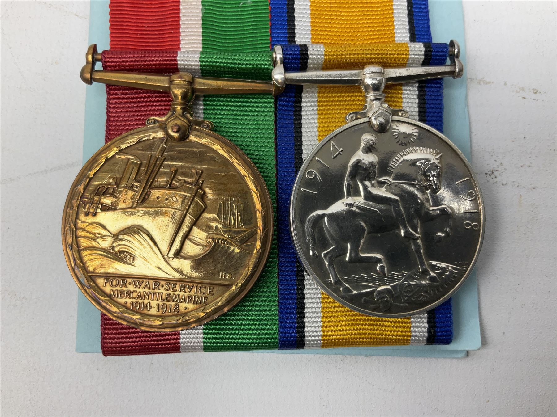 WW1 father and son medal groups comprising British War Medal and Mercantile Marine Medal awarded to Captain Allanson Hick and British War medal, 1914-15 Star and Victory Medal awarded to 1198 Pte. Allanson Hick E. York. R. with biographical information. N.B. Allanson Hick Jnr. of Hull was a celebrated architect and renowned marine artist being a founder member of the Society of Marine Artists (RSMA).