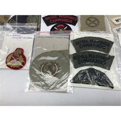 Royal Marines badges, including cap badges, collar titles, special boat service, trade and other cloth badges, blazer badges etc