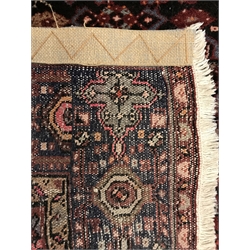 Hamadan red ground rug, repeating border (205cm x 140cm) and a Persian style matt (82cm x 57cm
