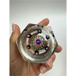 Glass Millefiori paperweight of hexagonal faceted form, H5cm