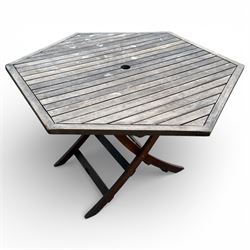Hexagonal garden table and set of four folding chairs