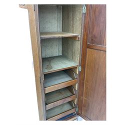 Late Victorian walnut triple combination wardrobe, projecting moulded and dentil cornice, central shaped bevelled mirror glazed door, cartouche and curled leaf carved panels over figured walnut veneered panels, fitted with drawer to base, on bracket feet