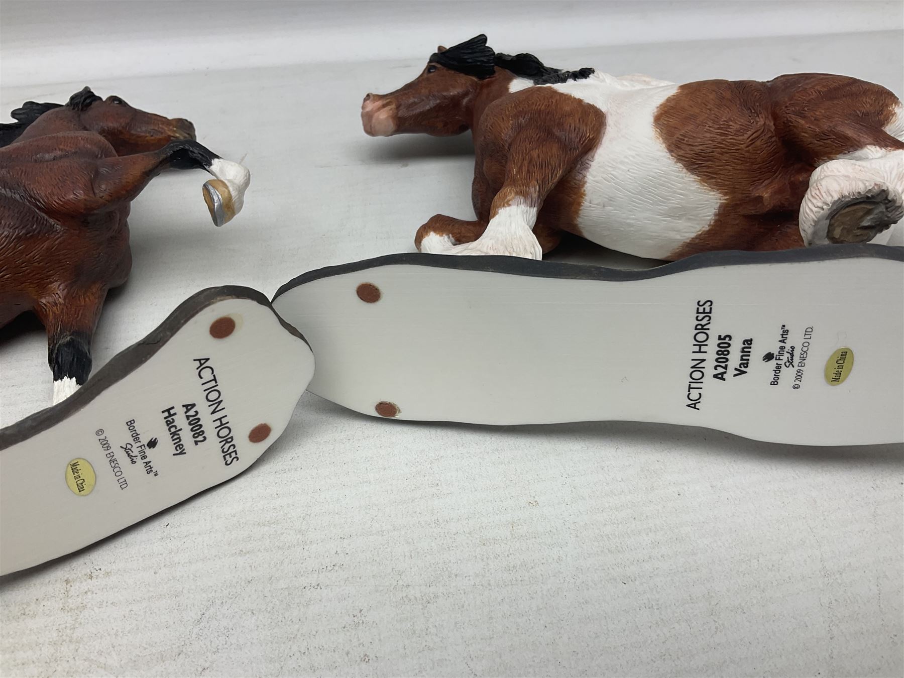 Seven Border Fine Arts figures, comprising Clydesdale Mare & Foal A0187, Highland Mare & Foal A2691 and five horses from the Action Horses series 