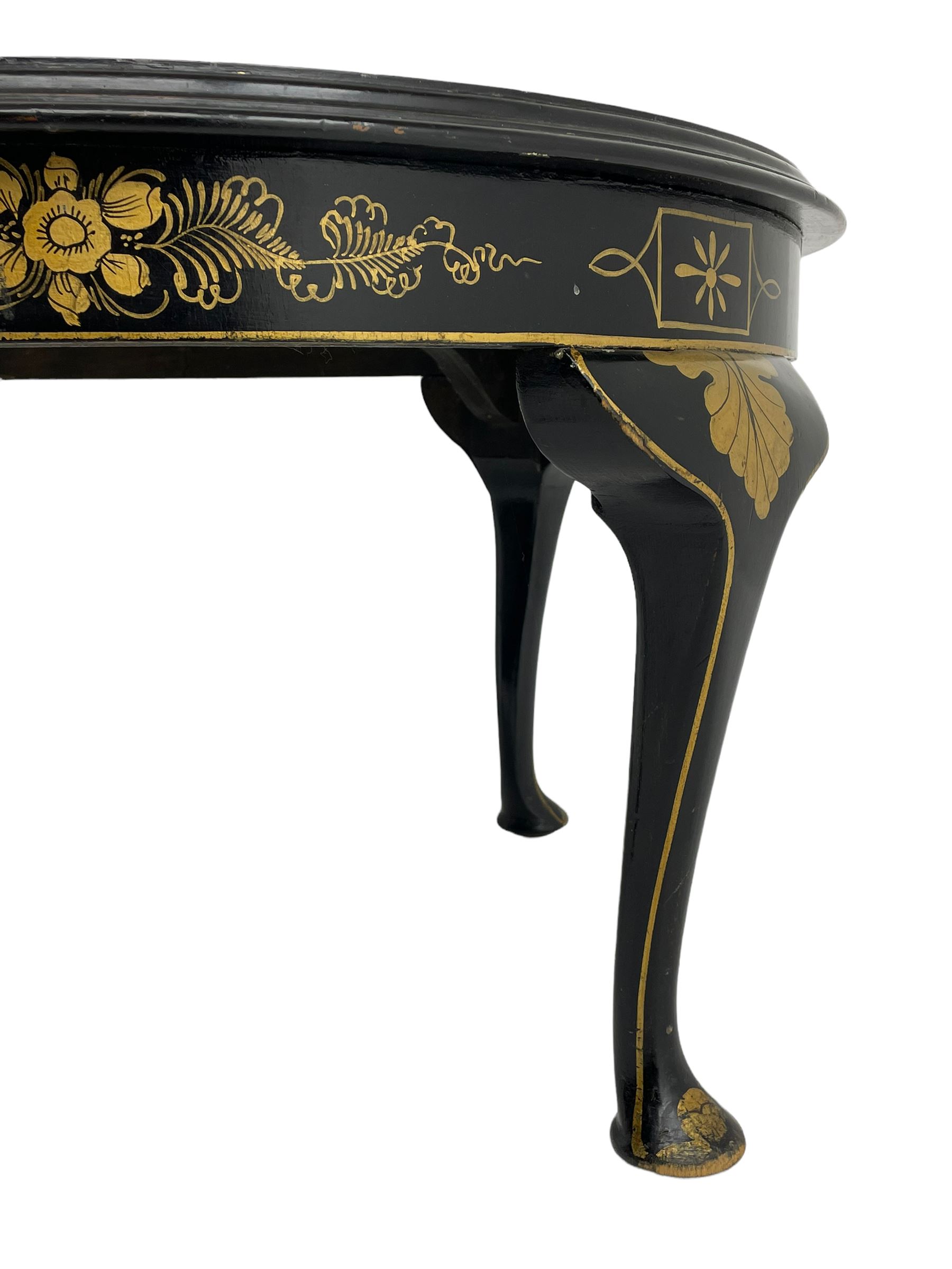 Early 20th century Chinoiserie lacquered circular occasional table, raised gilt decoration depicting traditional landscape scenes, on cabriole supports