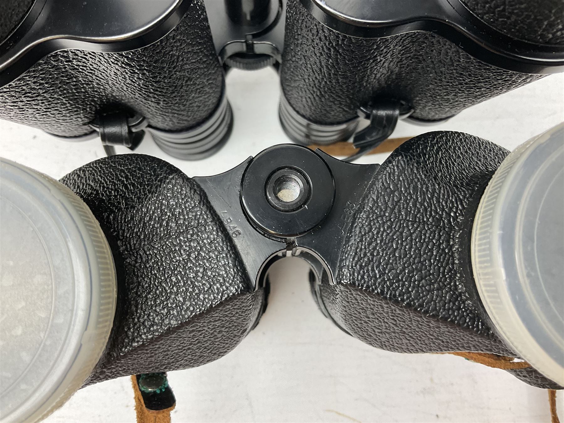 Twelve pairs of binoculars to include BWCF 7x35 Extra Wide Angle, Carl Zeiss Jena Delturis 8x24, Carl Zeiss Jena Jenoptem 8x30W, Chinon Countryman 10x50,  Ajax 8x30, Regent 16x50, etc,  some with cases